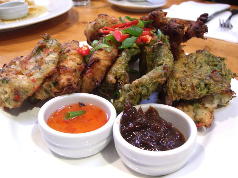 Yah Mon Jamaican Restaurants Serving Authentic Cuisine In Tampa Bay Stamp And Go Callaloo Fritters Jamaican Cuisine With Chilli Sauce