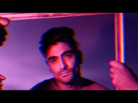 vardaan arora strikes a pose in like a polaroid music polaroid video