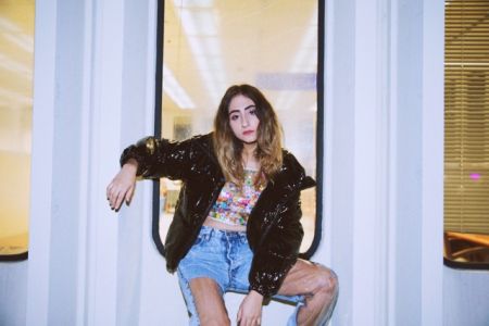 Listen to Disco Shrine's imminently danceable 'Up in the Air'