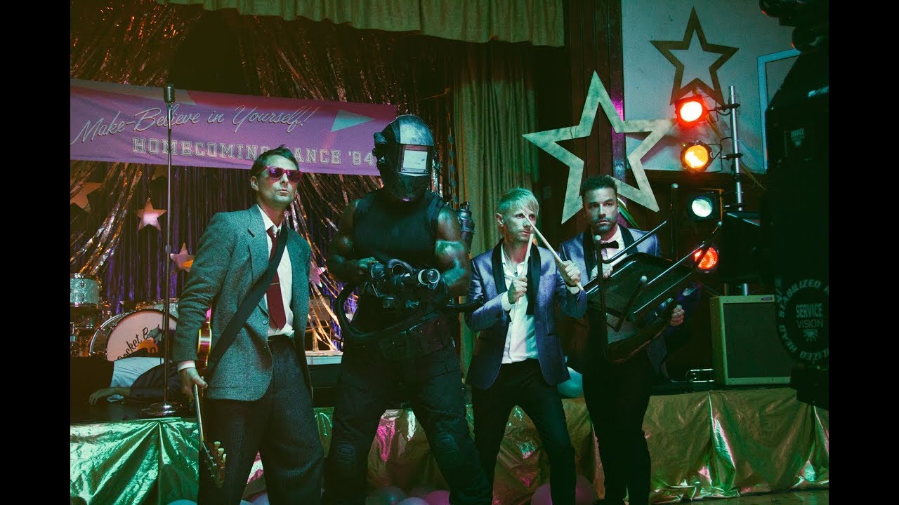Watch: Muse fight off gremlins with Terry Crews in video for new single, ‘Pressure’